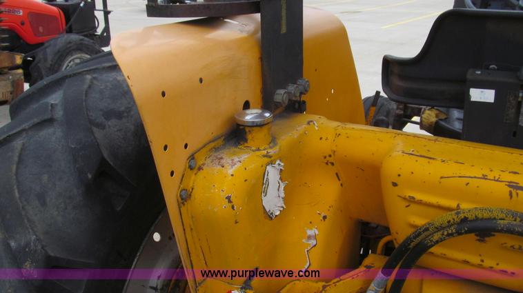 image for item E3867 1991 Case 595 tractor