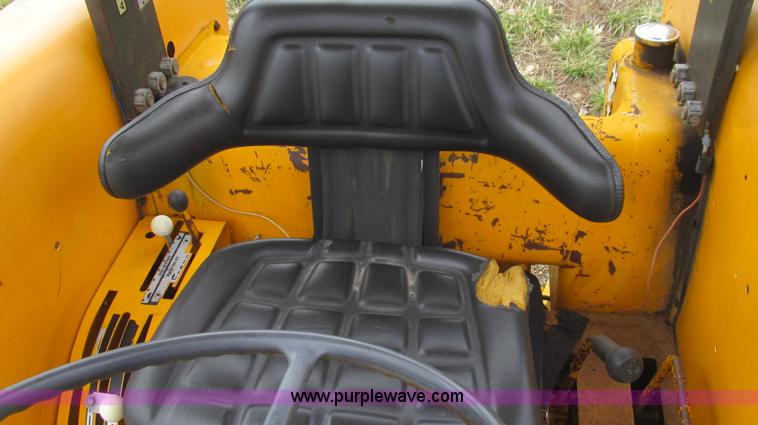 image for item E3867 1991 Case 595 tractor