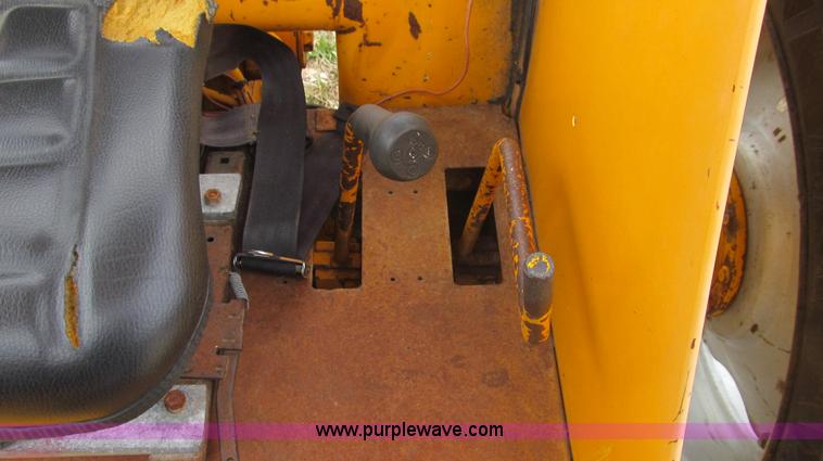 image for item E3867 1991 Case 595 tractor