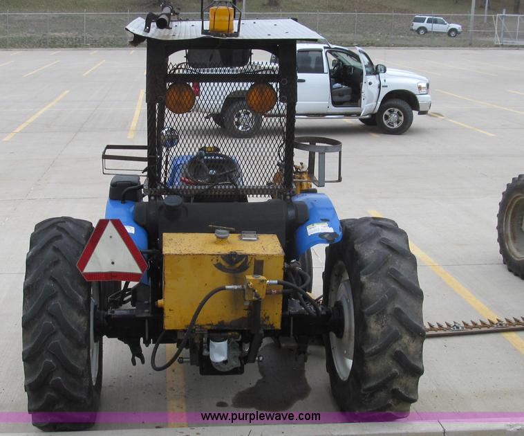 image for item E3870 2004 New Holland TN70 tractor