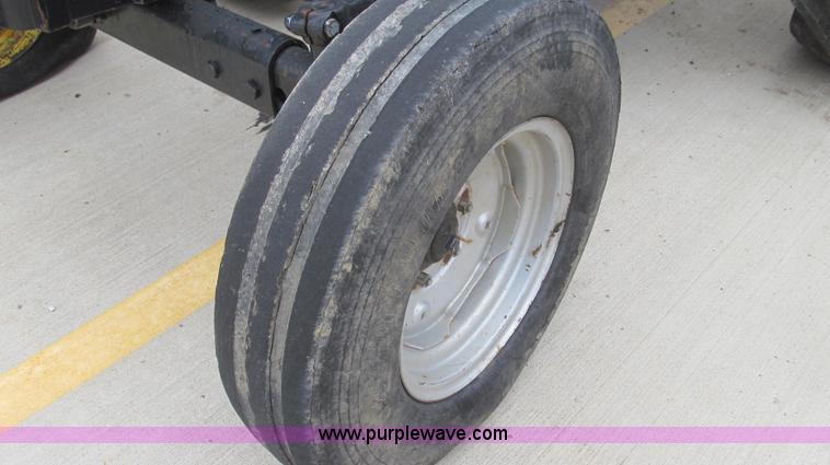 image for item E3870 2004 New Holland TN70 tractor