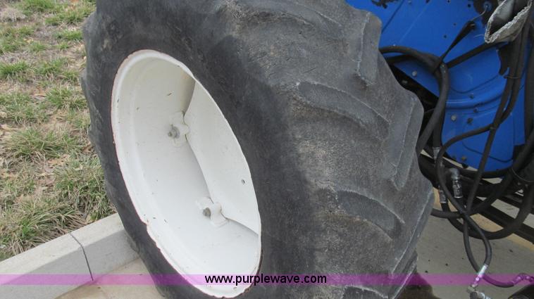 image for item E3870 2004 New Holland TN70 tractor