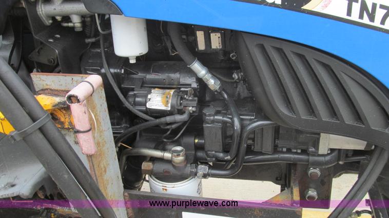 image for item E3870 2004 New Holland TN70 tractor