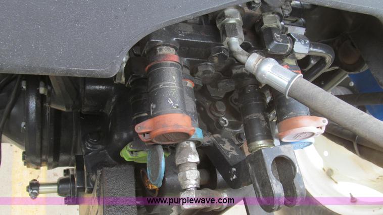 image for item E3870 2004 New Holland TN70 tractor