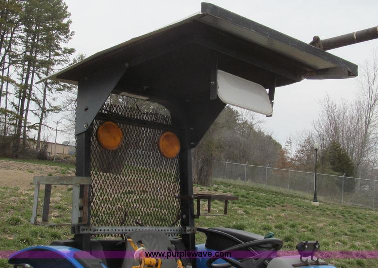 image for item E3870 2004 New Holland TN70 tractor