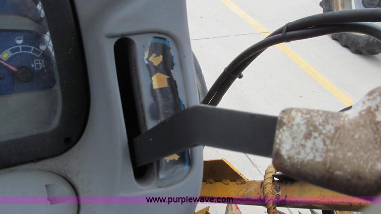 image for item E3870 2004 New Holland TN70 tractor