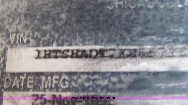 image for item E3899 1999 International 4900 dump truck