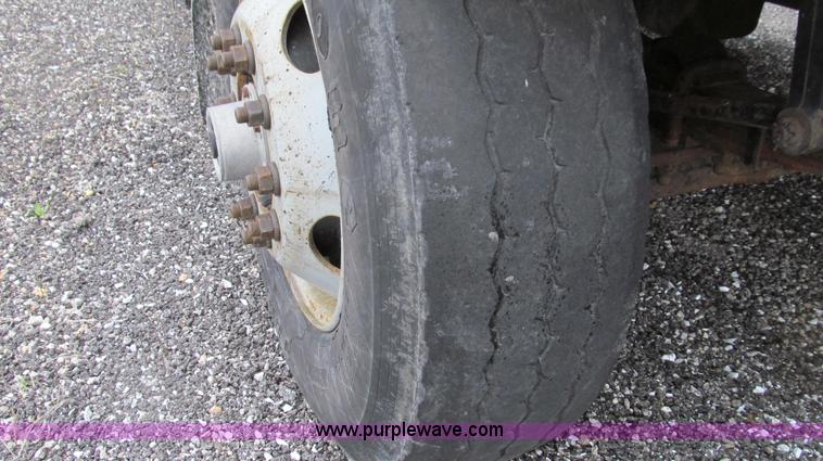 image for item E3902 2002 International 4900 CrewCab dump truck