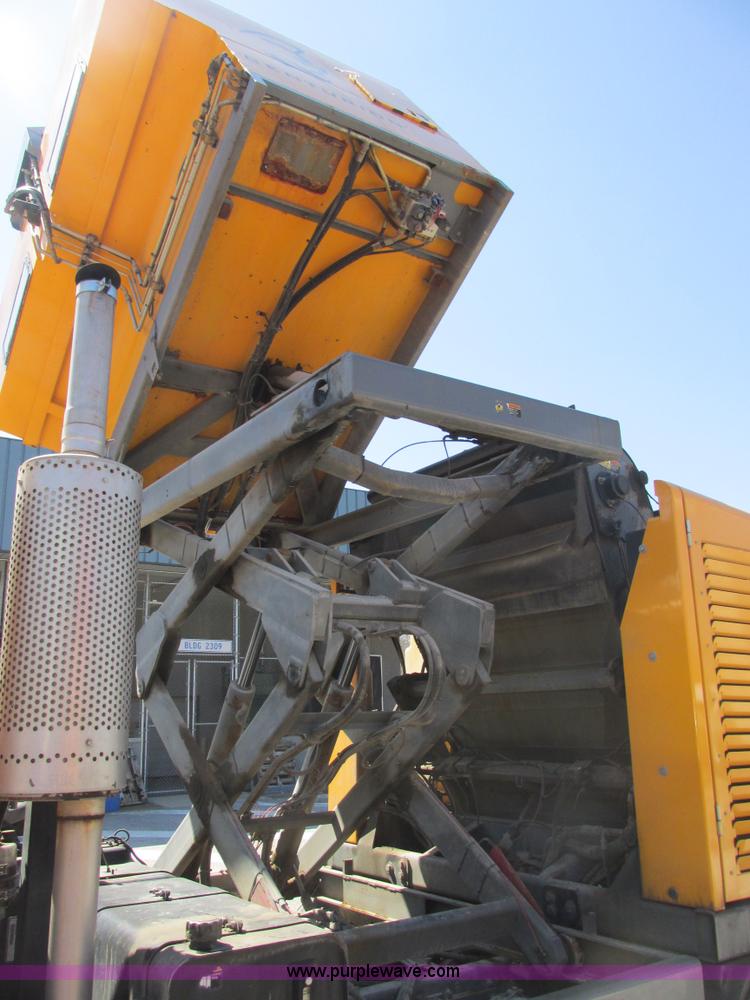 image for item E7170 2004 GMC T7500 Centurion street sweeper