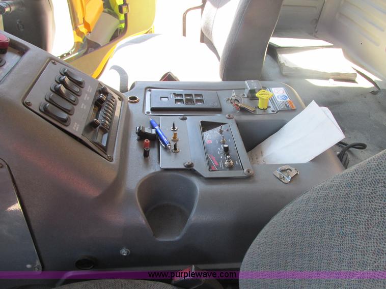 image for item E7170 2004 GMC T7500 Centurion street sweeper