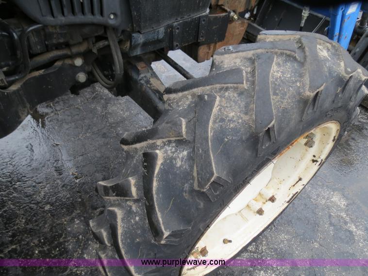 image for item F4338 2003 New Holland TN55D tractor