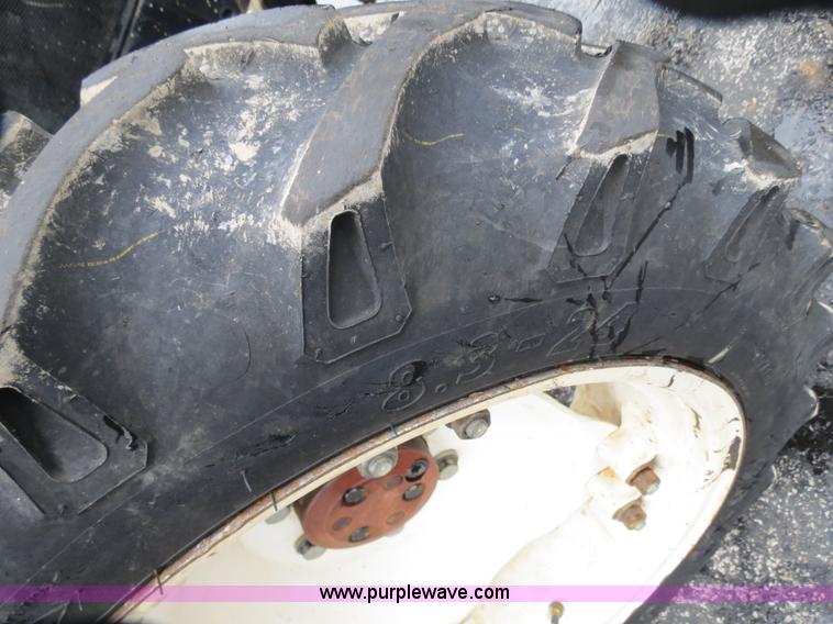 image for item F4338 2003 New Holland TN55D tractor