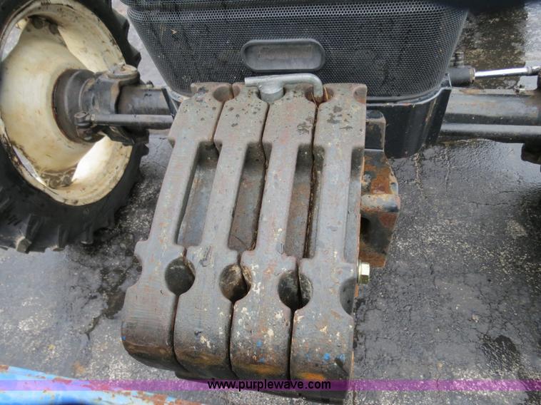 image for item F4338 2003 New Holland TN55D tractor