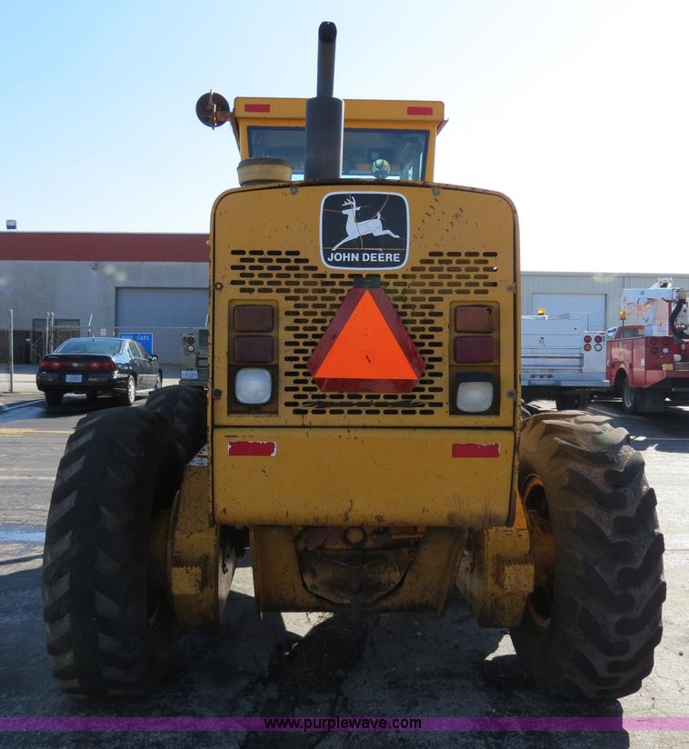 image for item F4349 1989 John Deere 670B articulated motor grader