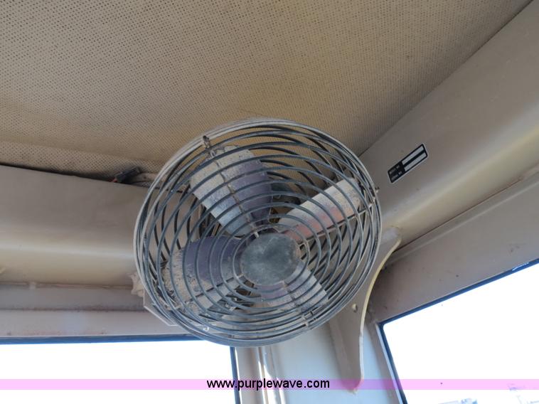 image for item F4349 1989 John Deere 670B articulated motor grader