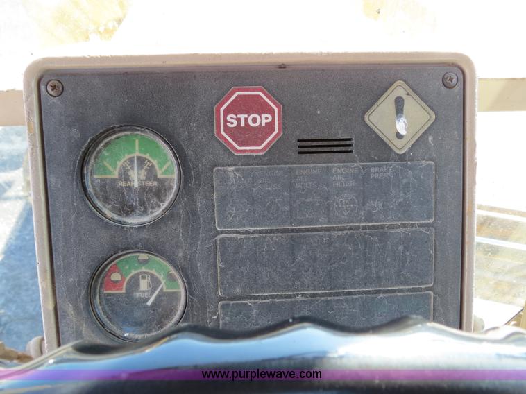 image for item F4349 1989 John Deere 670B articulated motor grader