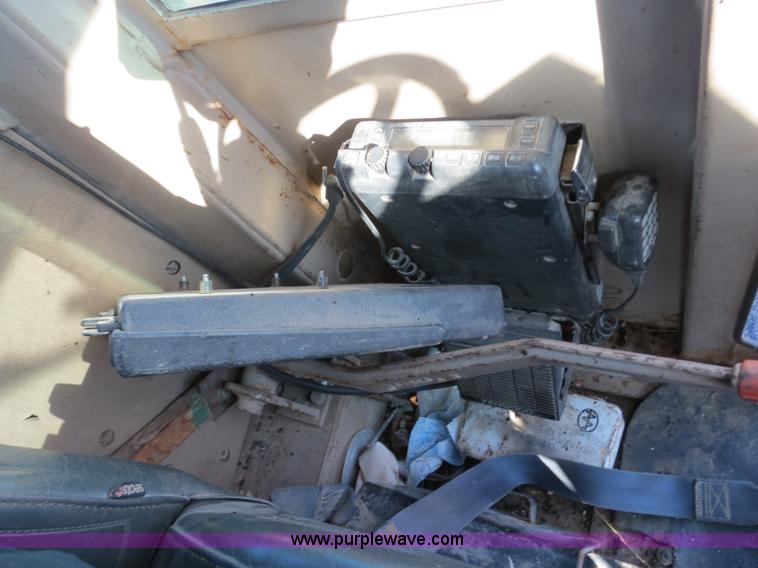 image for item F4349 1989 John Deere 670B articulated motor grader