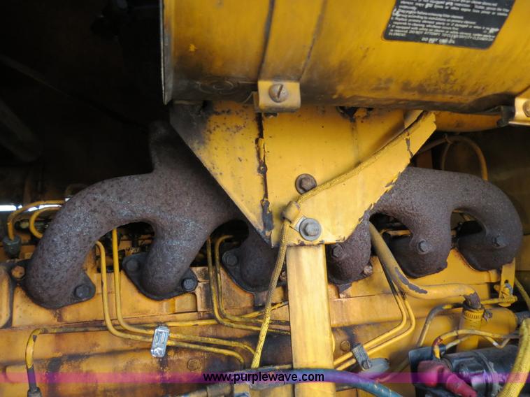 image for item F4349 1989 John Deere 670B articulated motor grader