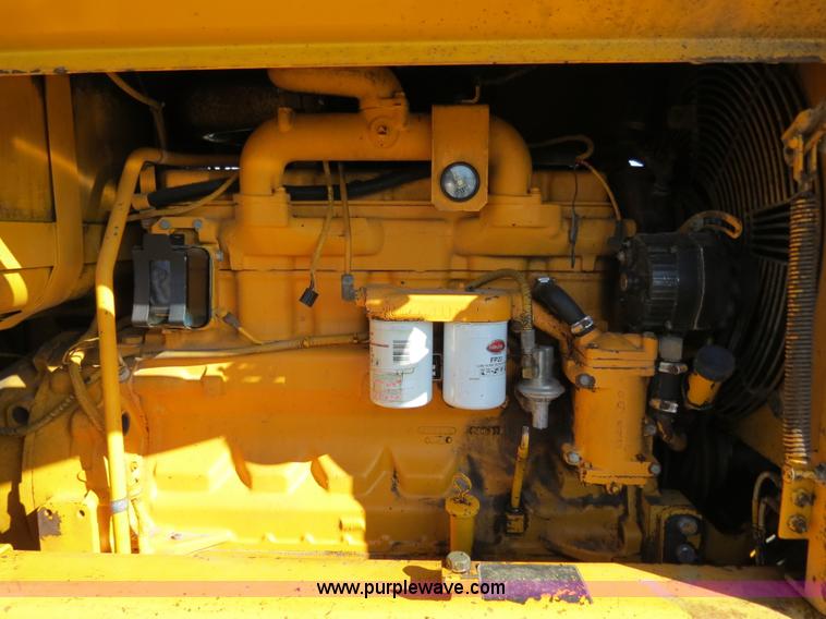 image for item F4349 1989 John Deere 670B articulated motor grader