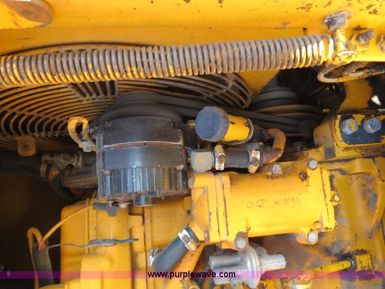 image for item F4349 1989 John Deere 670B articulated motor grader