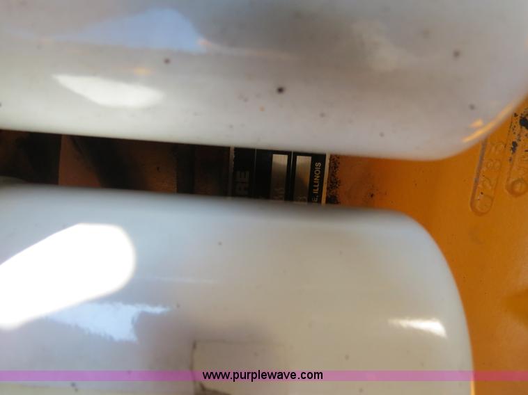 image for item F4349 1989 John Deere 670B articulated motor grader