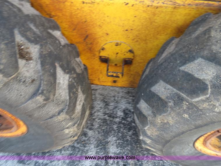 image for item F4349 1989 John Deere 670B articulated motor grader