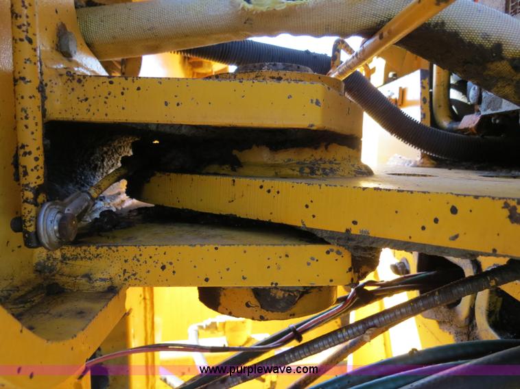 image for item F4349 1989 John Deere 670B articulated motor grader