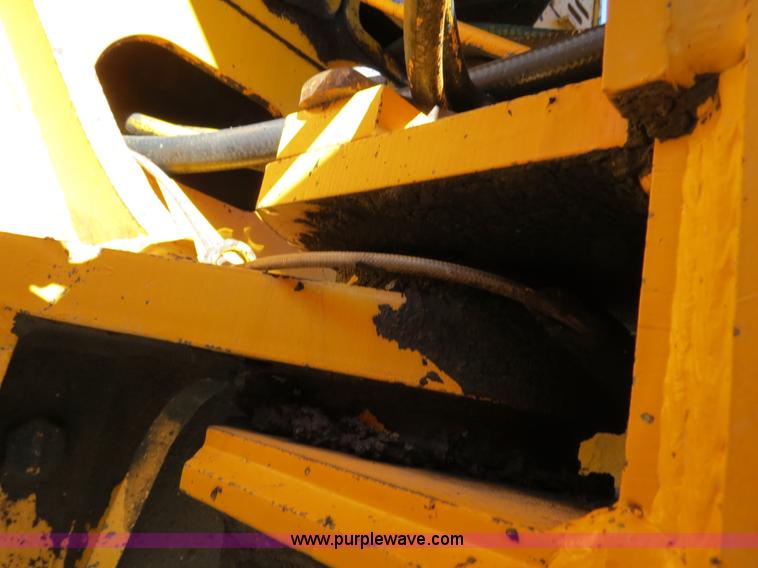 image for item F4349 1989 John Deere 670B articulated motor grader