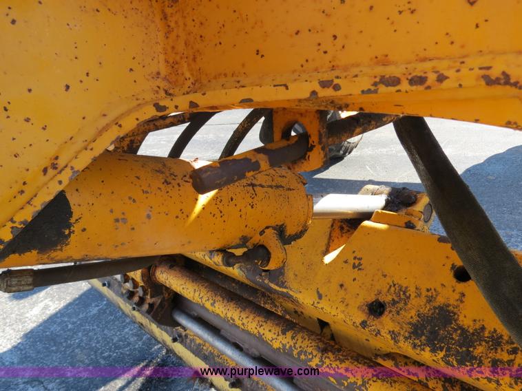 image for item F4349 1989 John Deere 670B articulated motor grader