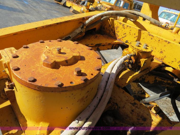 image for item F4349 1989 John Deere 670B articulated motor grader