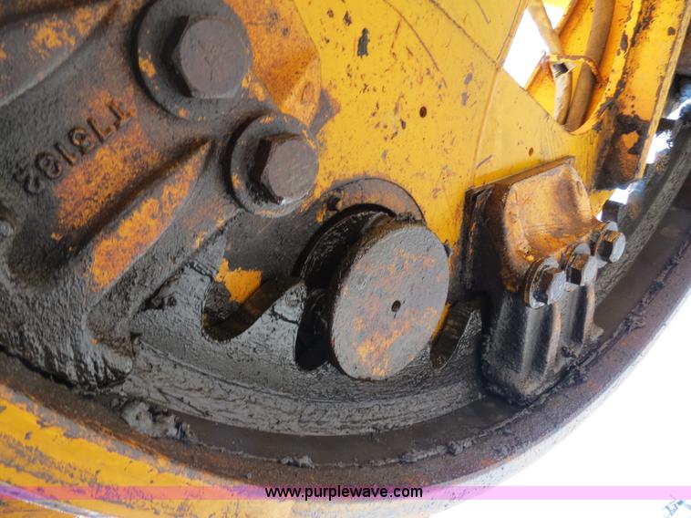 image for item F4349 1989 John Deere 670B articulated motor grader