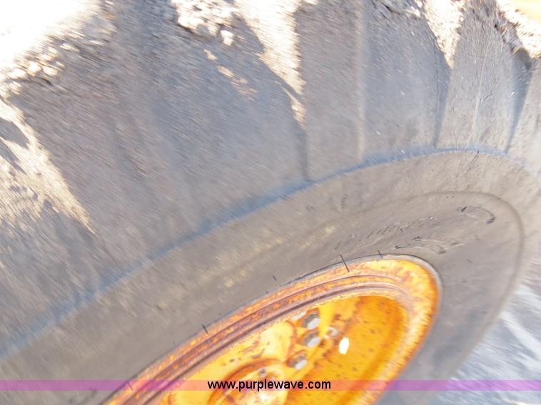 image for item F4349 1989 John Deere 670B articulated motor grader