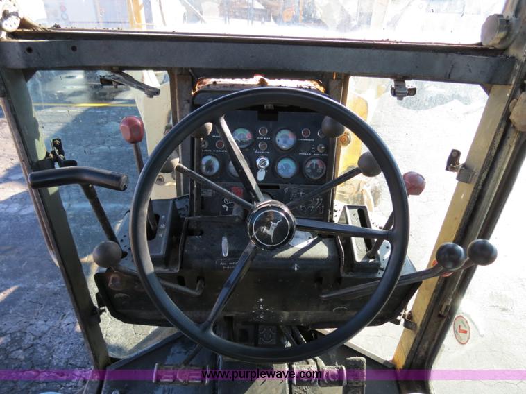 image for item F4352 1980 John Deere 670A articulated motor grader