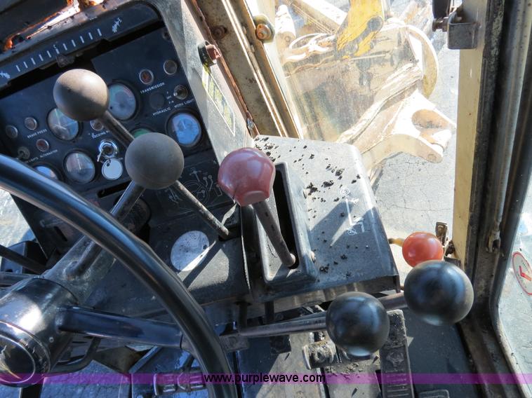 image for item F4352 1980 John Deere 670A articulated motor grader