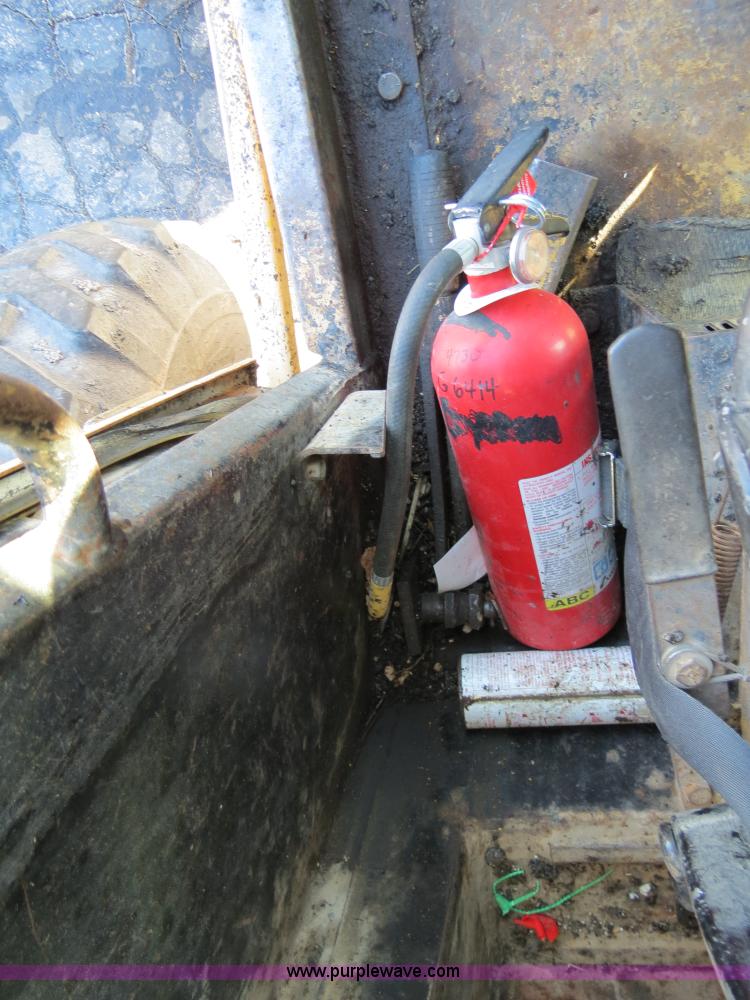 image for item F4352 1980 John Deere 670A articulated motor grader