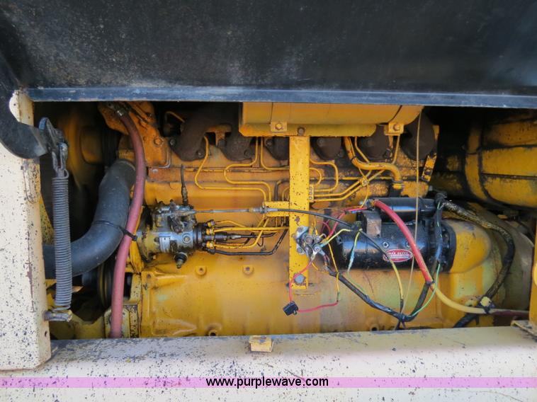 image for item F4352 1980 John Deere 670A articulated motor grader