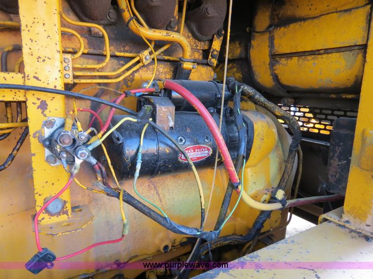 image for item F4352 1980 John Deere 670A articulated motor grader