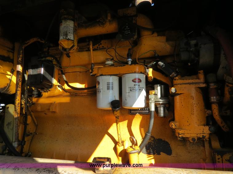 image for item F4352 1980 John Deere 670A articulated motor grader