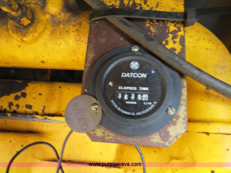 image for item F4352 1980 John Deere 670A articulated motor grader