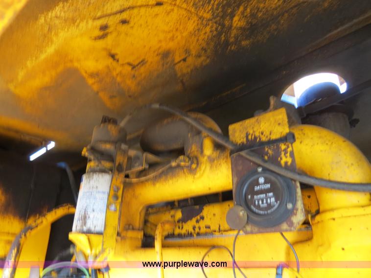 image for item F4352 1980 John Deere 670A articulated motor grader