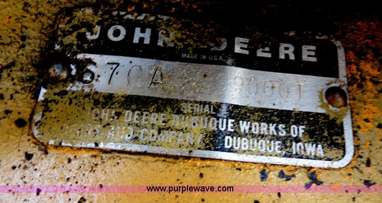 image for item F4352 1980 John Deere 670A articulated motor grader