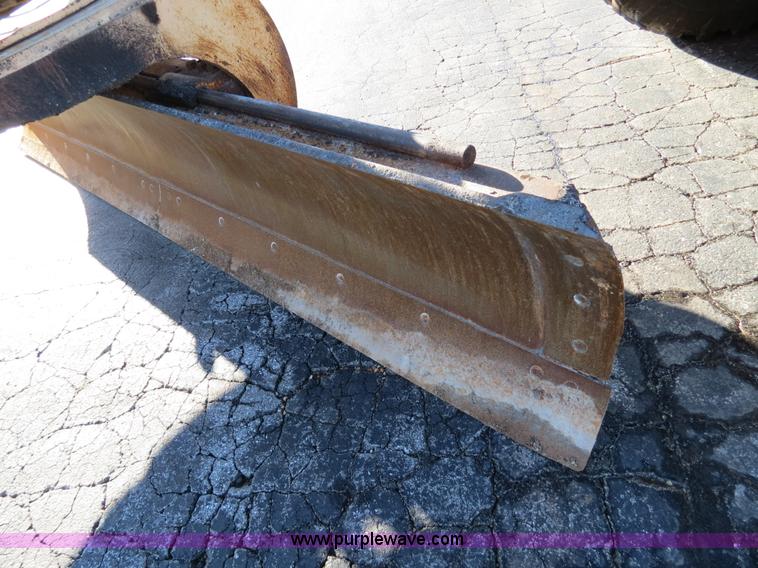 image for item F4352 1980 John Deere 670A articulated motor grader