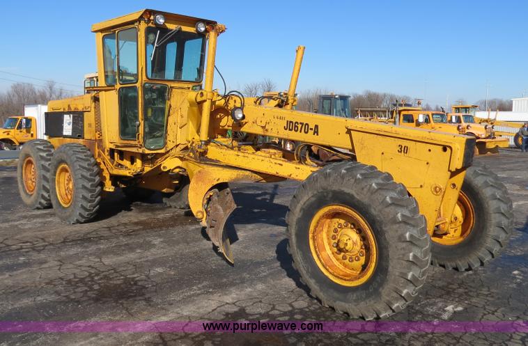 image for item F4353 1980 John Deere 670A articulated motor grader