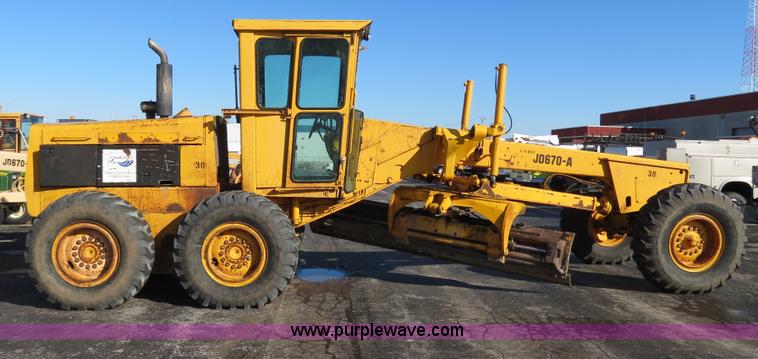 image for item F4353 1980 John Deere 670A articulated motor grader