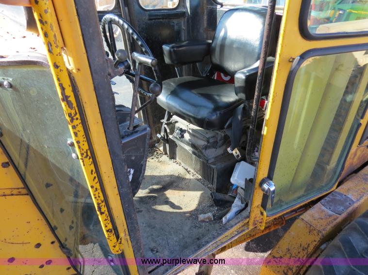 image for item F4353 1980 John Deere 670A articulated motor grader