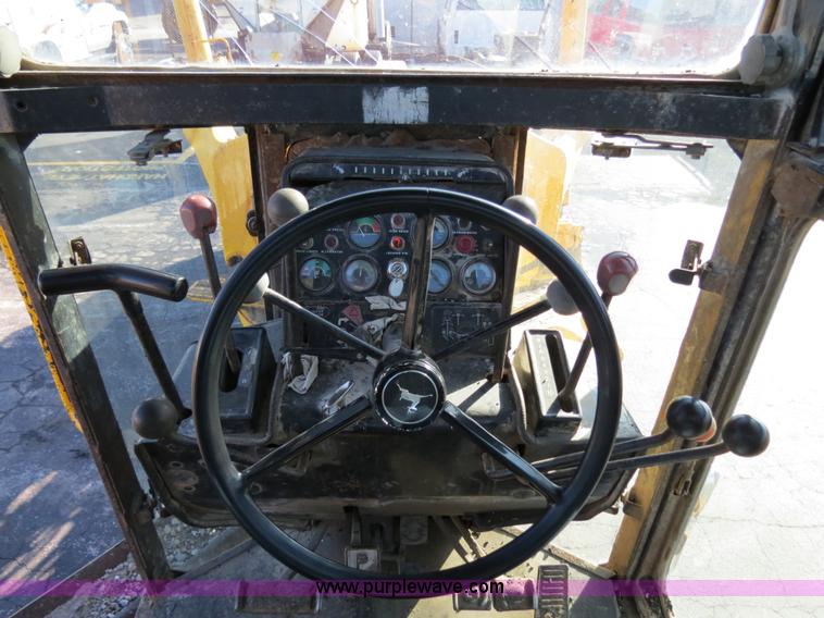 image for item F4353 1980 John Deere 670A articulated motor grader