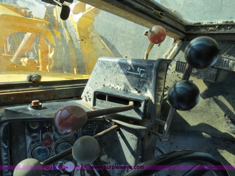 image for item F4353 1980 John Deere 670A articulated motor grader