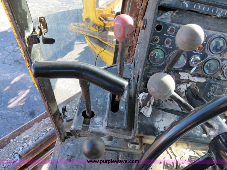 image for item F4353 1980 John Deere 670A articulated motor grader