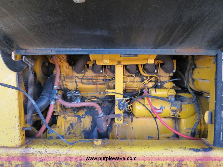 image for item F4353 1980 John Deere 670A articulated motor grader