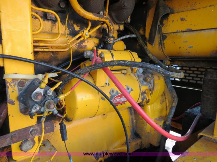 image for item F4353 1980 John Deere 670A articulated motor grader